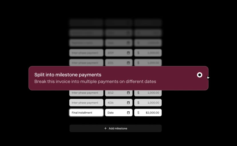 Invoice split into deposit and milestone payments with separate due dates